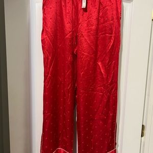 Victoria’s Secret pink women satin pajamas pants. Size L